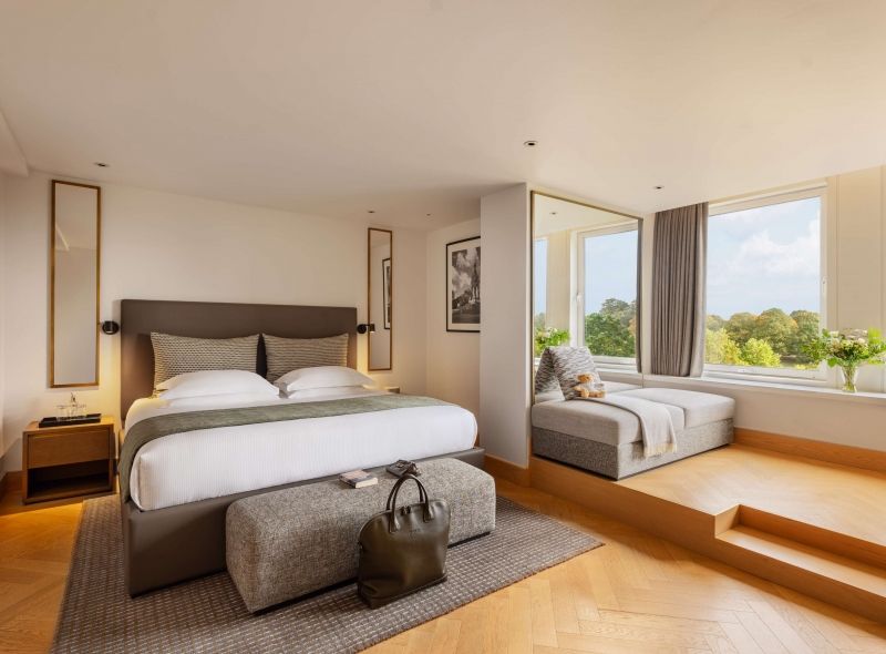 The newly refurbished Park Suites at Royal Garden Hotel features a lavish king bed, extra space, and a beautiful view of Kensington Gardens.