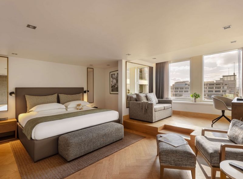 Newly refurbished guest rooms and suites at Royal Garden Hotel.
