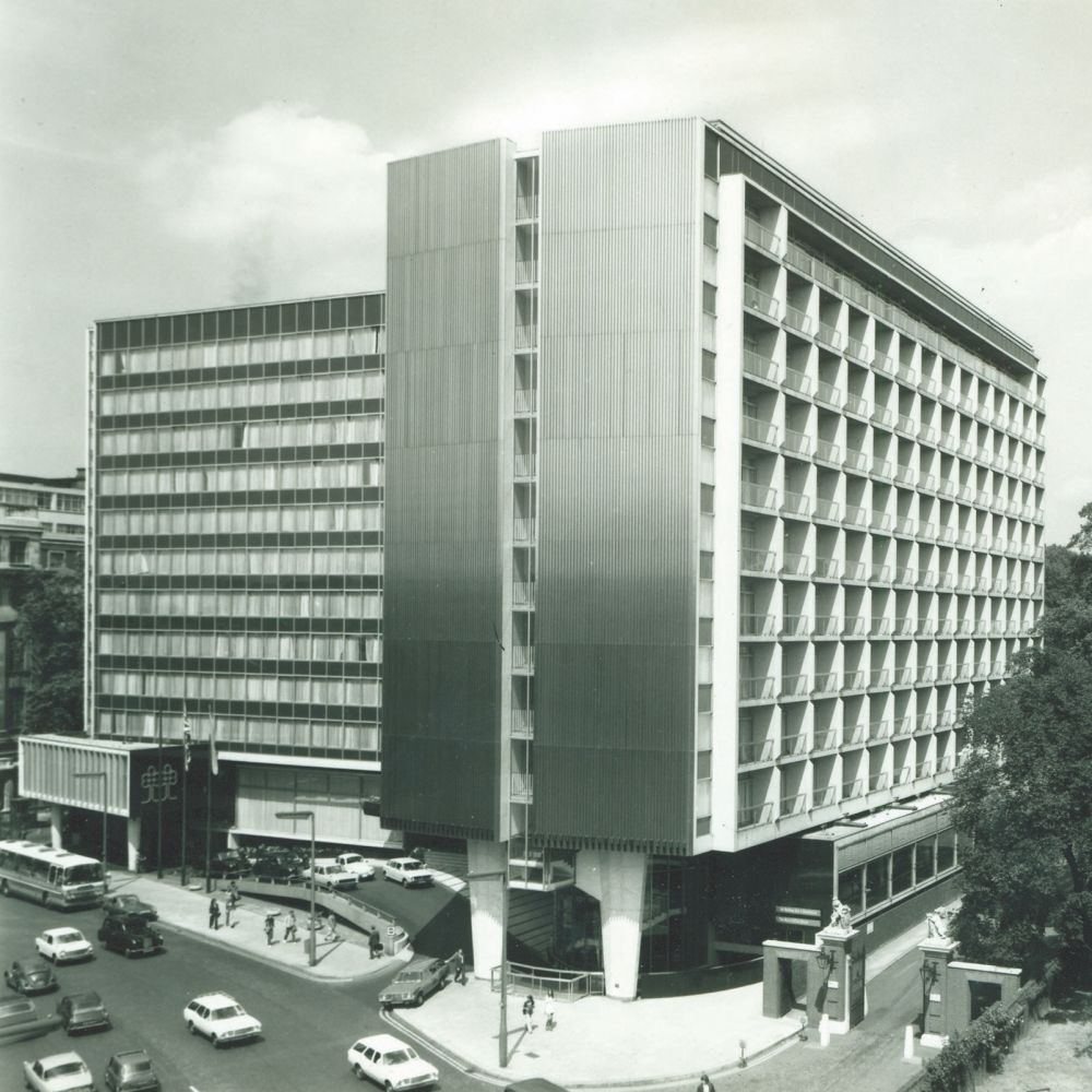 The facade of Royal Garden Hotel was rebuilt and opened in 1965.
